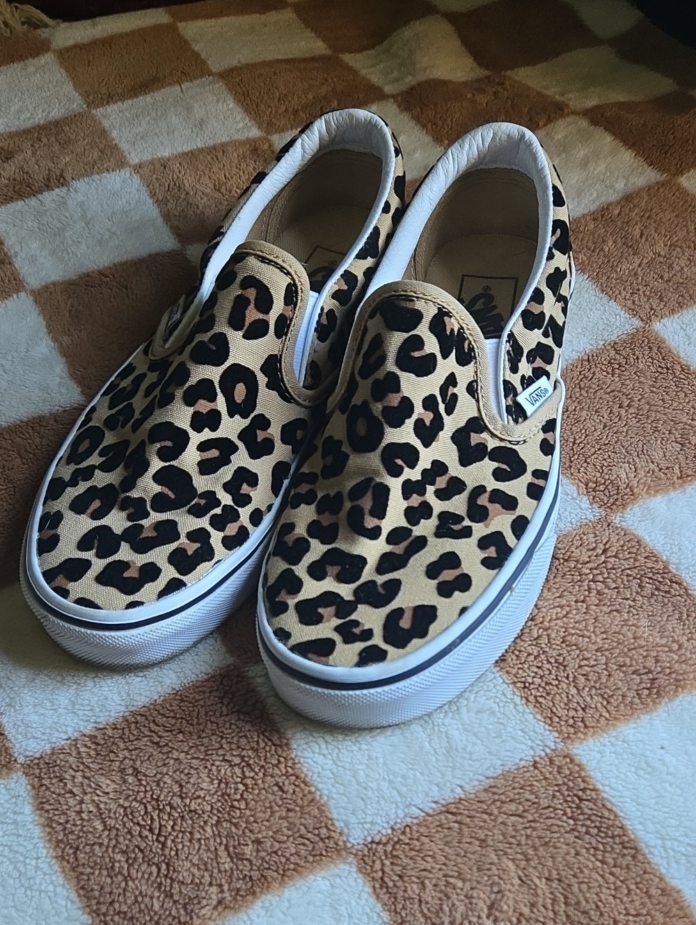 Vans Leopard Print Slip-On Sneakers in Tan and Black